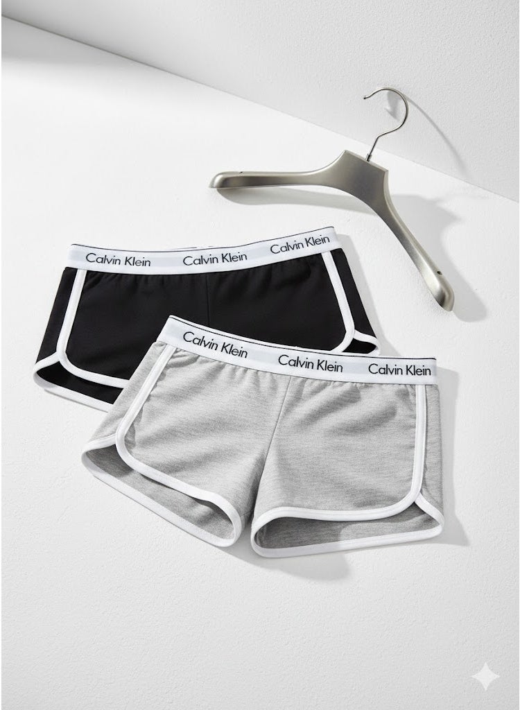 كالفن كلاين بيرفورمانس طقم هوت شورت رياضي حريمي قطعتين بخصر عالي – خامة ممتازة وراحة مثالية للرياضة والاستخدام اليومي - مقاس ميديم - Image 1